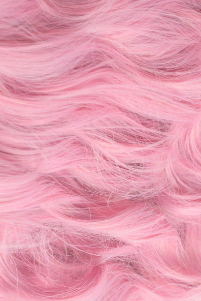 istock Pink wavy hair pattern. Top view. 1768430915
