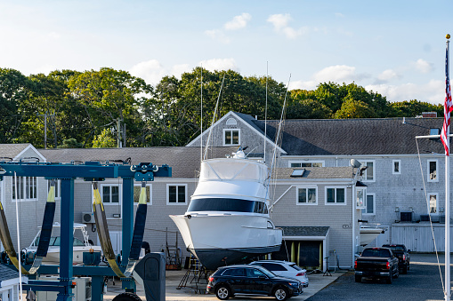 Falmouth harbour on Nantucket Sound.  There are a vast array of yachts and motorboats moored in the marina.