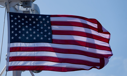 Mount Pleasant, South Carolina, USA - February 8, 2015: The bridge of the retired aircraft carrier USS Yorktown and American Flag in Patriots Point, South Carolina.