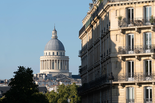 Historic La Conciergerie Buildings and tower of Notre Dame Cathedral in the Ile de la Cite in central Paris, France.