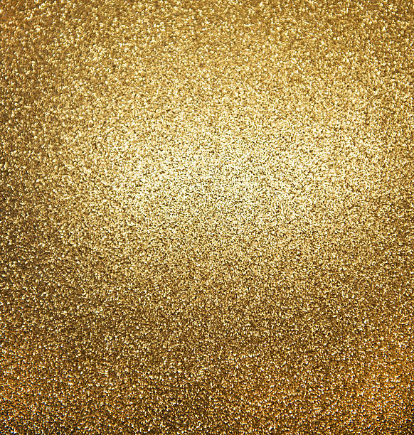 istock abstract golden shiny lights background 176844629