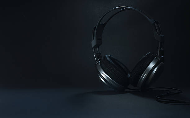istock Silver big headphones on black background 176844937