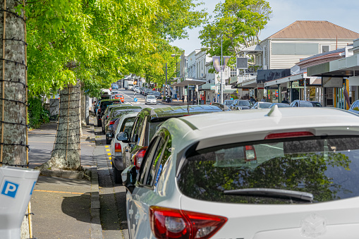 Cars parked seamlessly on Parnell road in Auckland in the daytime