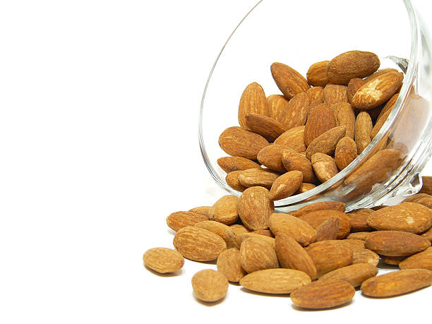 almonds in glass plant stock photo