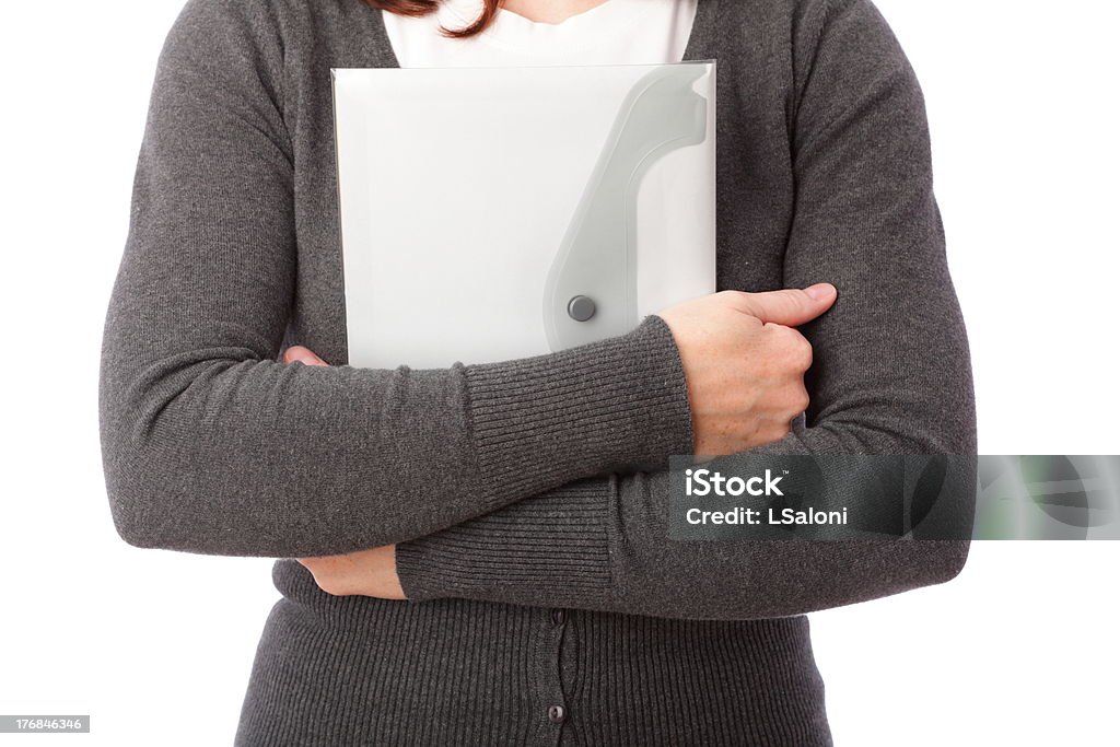 businesswoman with folder, isolated on white "businesswoman in grey with folder, isolated on white" Adult Stock Photo