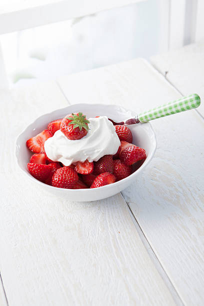 istock Strawberries with whipped cream 176846961