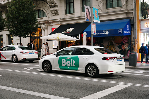 Madrid, Spain - 29 October, 2023: A car from the Bolt car-hailing service in Madrid, Spain