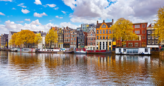 Early morning view of Amsterdam city and canal in Amsterdam, North Holland, Netherlands