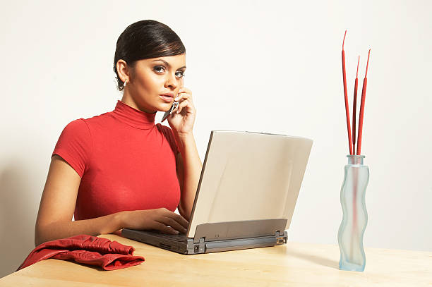 Cтоковое фото Деловая женщина с ноутбуком и телефон