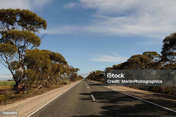 Road To Nowhere In The Riverland South Australia Stock Photo - Download Image Now - Asphalt, Bush, Cloud - Sky