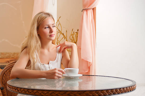 istock Young woman in cafe 176848929