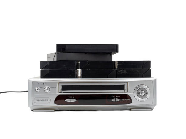 istock VHS cassette video recorder on a white background. 1768489737
