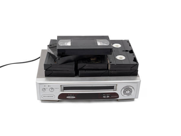istock VHS cassette video recorder on a white background. 1768490911