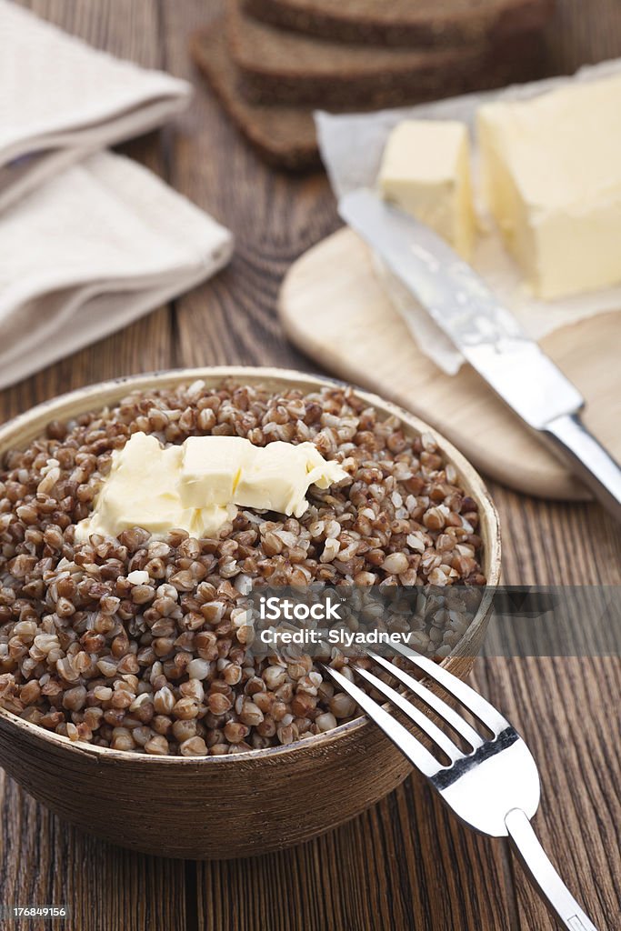 Buckwheat porridge – russian cuisine Russian cuisine - buckwheat porridge and rye bread with butter Breakfast Stock Photo