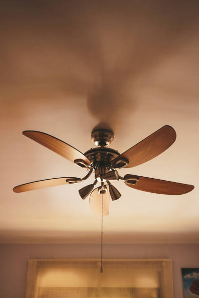 istock Wooden roof fan inside a home 1768492954