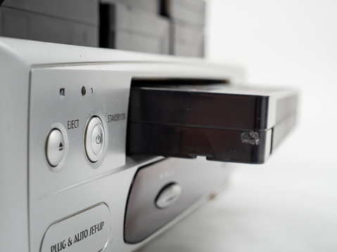 VHS cassette video recorder on a white background. Retro video recorder.