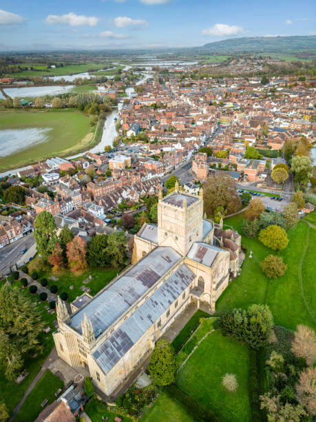 istock Tewksbury Abbey with town behind 1768492979