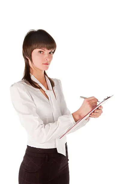 The young girl in white blouse with tablet for papers.  Isolated. White background