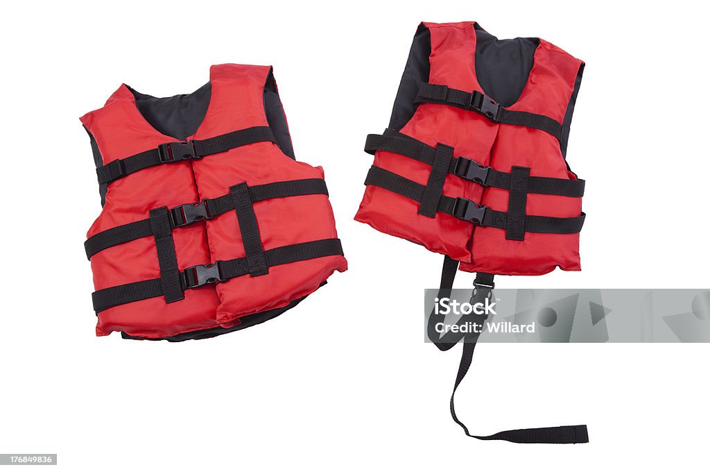 Red and black children's life jackets isolated on white "Red and black children's life jackets, child and youth sizes, isolated on white" Life Jacket Stock Photo