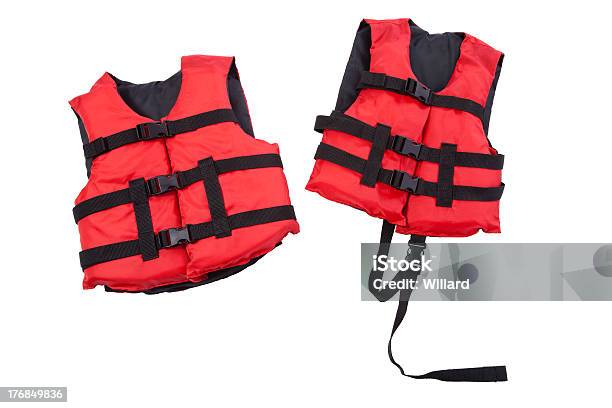 Red And Black Childrens Life Jackets Isolated On White Stock Photo - Download Image Now