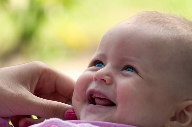 tickled happy baby stock photo