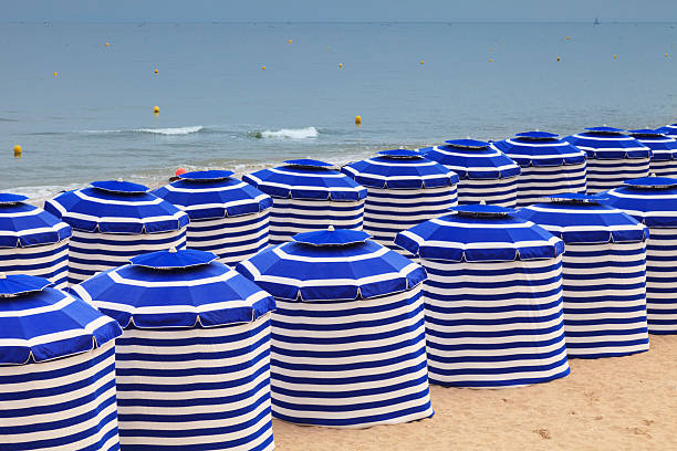 istock Blue White Stripe Beach Huts Cabourg Normandy France 176850341