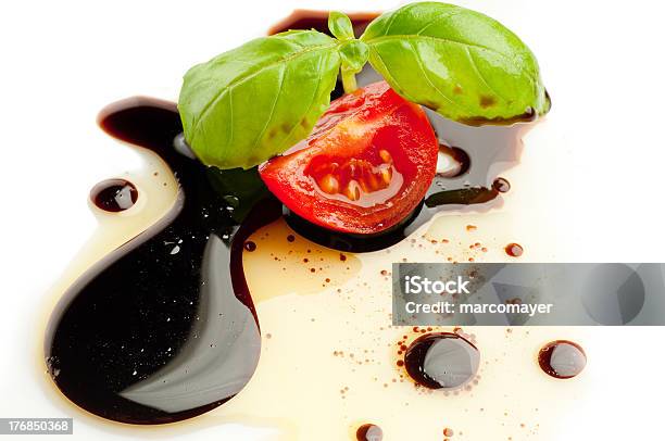 Slice Tomato And Basil Stock Photo - Download Image Now - Balsamic Vinegar, Tomato, Vinegar