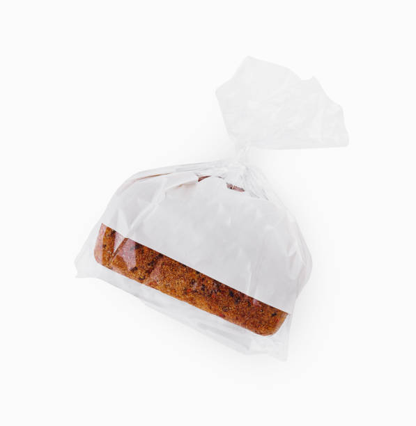 istock Loaf of wheat bread in plastic bag isolated 1768511269