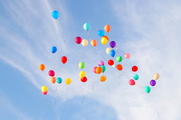 balloons on sky stock photo