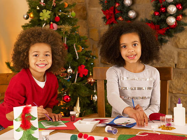 istock Mixed race children making Christmas cards 176851722