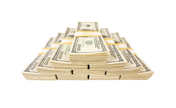 istock Stacks of One Hundred Dollar Bills on White 176852404