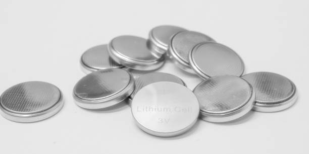 istock lithium batteries on white background. lithium cell, the precious metal element lithium 1768524127