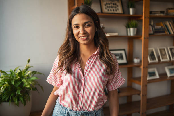 istock Smiling Latin woman looking at the camera 1768525867