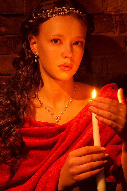 istock Girl with candle 176852636