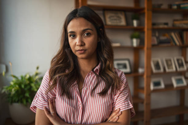 istock Serious woman looking at the camera 1768527319