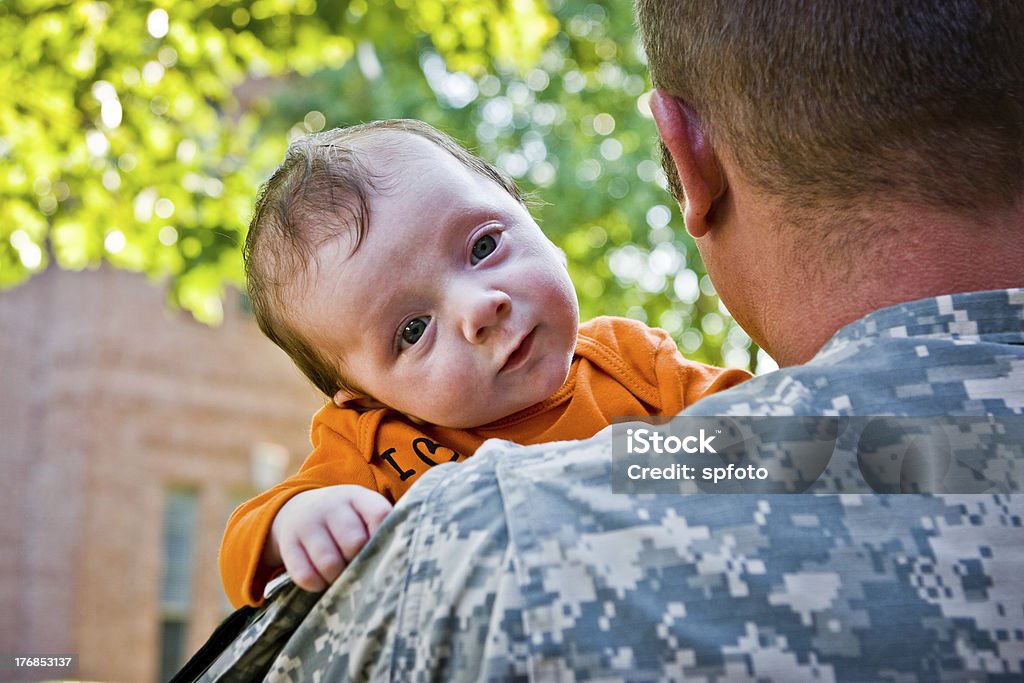 Military Daddy Strong and tender an army man holding his new baby.More of them here - Army Stock Photo
