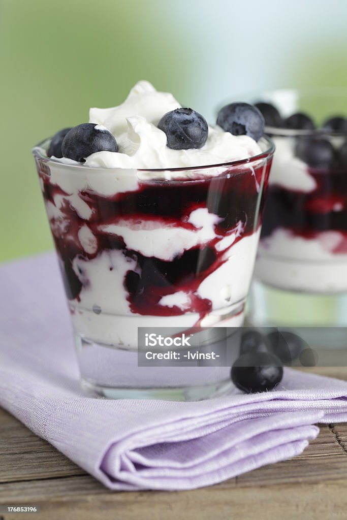 Perfect blueberry Parfait with blueberry and yogurt in the glass Black Color Stock Photo