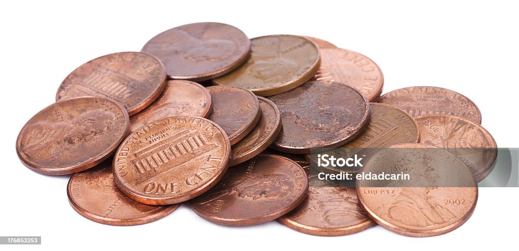Isolated Pile of Pennies A pile of 1 US cent (penny) coins isolated on white background. This is the version of the penny that was produced between the years 1959-2008, depicting the Lincoln memorial. Abraham Lincoln Stock Photo