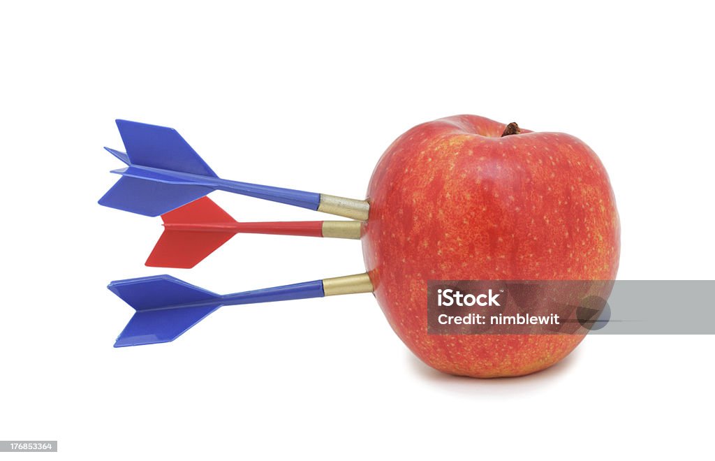 Apple hit by arrows, isolated "Apple hit by arrow, isolated on a white background" Accuracy Stock Photo