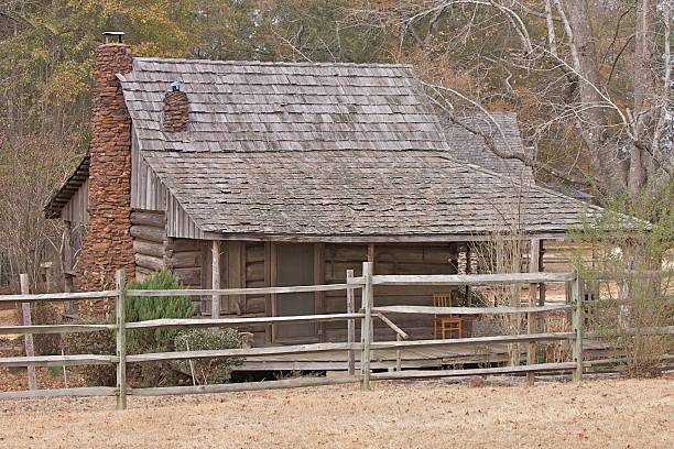 istock Log House And Split Rail Fence 176853999