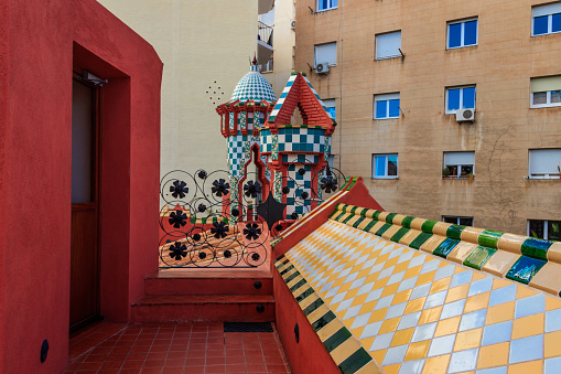 Barcelona, Spain - December 15, 2022: Details from the roof of Casa Vicens in Barcelona, Spain. It is first masterpiece of Antoni Gaudi. Built between 1883 and 1885