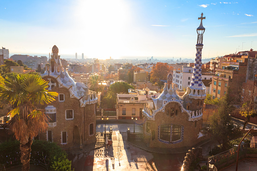 Barcelona, Spain - December 16, 2022: View of fairytale gingerbread houses in Park Guell designed by Antoni Gaudi in Barcelona, Spain