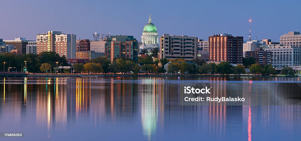 Scenery of Madison with a lake and tall office buildings Panoramic image of Madison (Wisconsin) at twilight. This is stitched composite of 5 vertical images. Madison - Wisconsin Stock Photo
