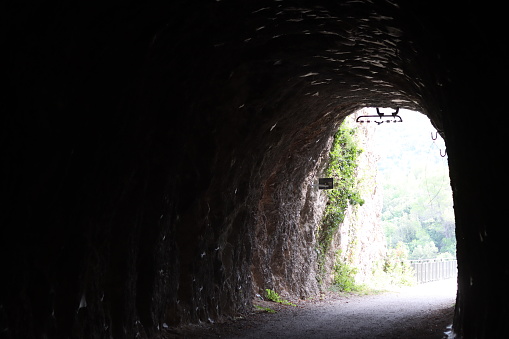 View along a disused railway tunnel, on an abandoned train line