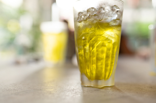 Iced yellow chrysanthemum tea in cup