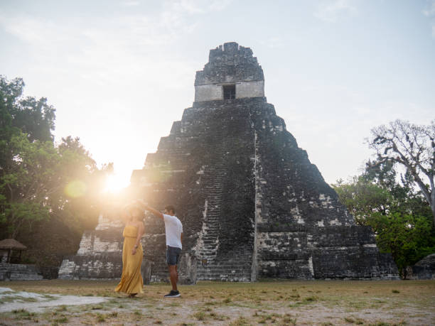 istock Couple sightseeing the Tikal ruins 1768567138