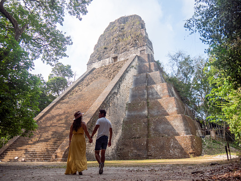 Sunny day, the temple stands in the middle of the rainforest