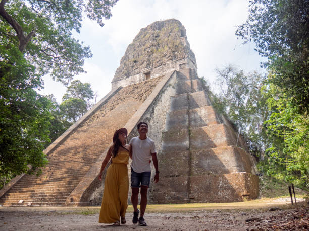 istock Couple sightseeing the Tikal ruins 1768567681
