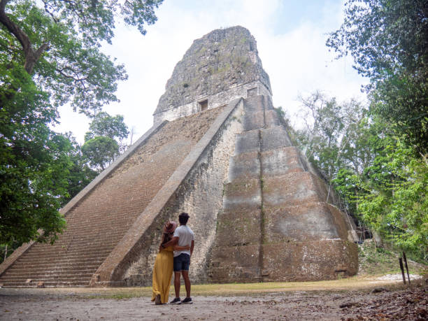 istock Couple sightseeing the Tikal ruins 1768567687