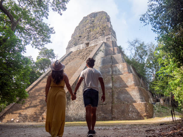 istock Couple sightseeing the Tikal ruins 1768567688